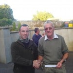 Gerry Madden receiving 2-nd prize from chairman Derek Madden