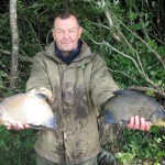 Nigel with a nice couple of Bream from his catch.