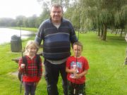 All age groups turn out for the Templemore pike competition Ruth and Daniel with chairman Kevin Mason