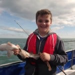 Crew member with his fish..