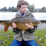8-year old fishing fanatic Daniel Heaney wtih his 14lb 4oz Common carp