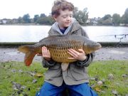 Super young fisherman shows the way and lands a cracking 14lb 4oz carp 8-year old fishing fanatic Daniel Heaney wtih his 14lb 4oz Common carp