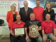 Small craft warning as ‘Screaming Reels’ again victorious in Rosslare boats festival – Irish Times Attending the Small Boats Festival in Co Wexford (back row, from left): Orla Woods, Fáilte Ireland; Minister Fergus O’Dowd; John Belger (UK); Josie Mahon, Inland Fisheries Ireland. Front row: winning team of M Rayner, S Shults and N Murphy