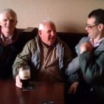 CELEBRATING THEIR CATCH OVER A PINT