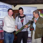 Organiser Michael Drinan presenting Knockaderry Perpetual trophy to winner Brian Brennan