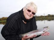 Southern Sue from the land downunder enjoys the rainbows in Mullingar South Australia Ladies Angling club member Sue Atkins pictured with a beautiful rainbow trout