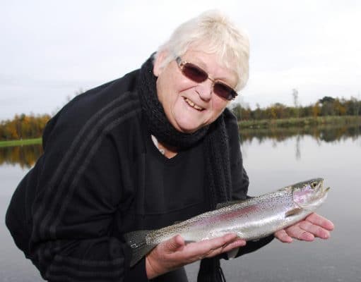 South Australia Ladies Angling club member Sue Atkins pictured with a beautiful rainbow trout
