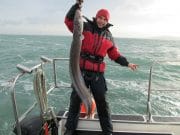 At last a bit of fishing as Hamish battles the storm !