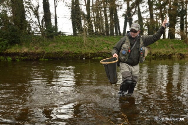 David landing a trout on Liffey