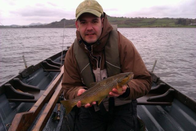 Don McCloskey with a lovely March Brownie on Lough Fern