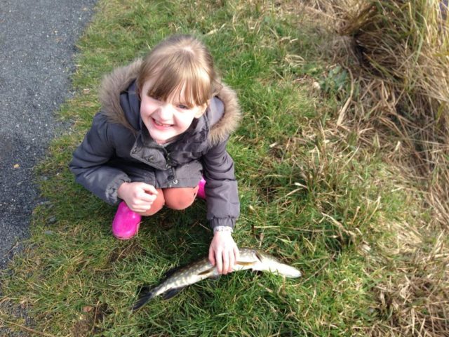 Rosie O'Connor with her pike from the Royal Canal