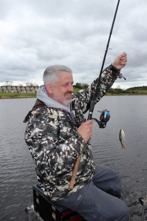 A Happy Carl Mc Dermott With Roach on Town Lake