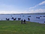 Irish Angling Update – 01/05/14 Boats heading out from the Carrick shore in very bright conditions at the start of the Corr na Mona Anglers competition for Galway Hospice