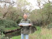 Slightly overdue but very welcome – Nigel lands the first fish at Kylemore Nigel Rush with the first salmon of the season from the Kylemore Abbey Fishery, April 2014