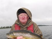 Owel fishing well as International kicks off ohn Collinson and his super Owel trout.