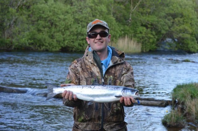 Gene Haran with his fish from the Upper Mill on a silver Allys