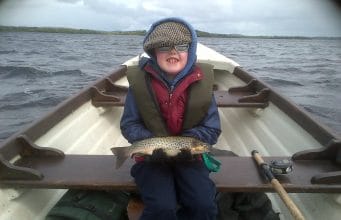 Charlie Cooke (age 9) with a fine 1.5 lbs. trout on the dap from Lough Arrow