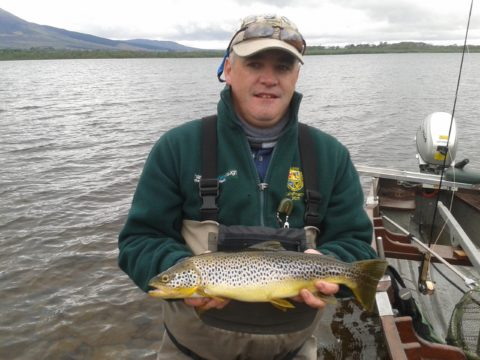  Michael Monaghan with a lovely 3 lbs. trout from Castlehill Bay on a Grey Wulff