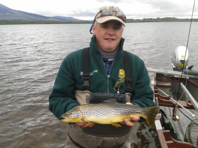 Michael Monaghan with a lovely 3 lbs. trout from Castlehill Bay on a Grey Wulff