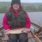 Muriel Frazer with her magnificent Lough Arrow trout (5 lbs. 6 oz.)