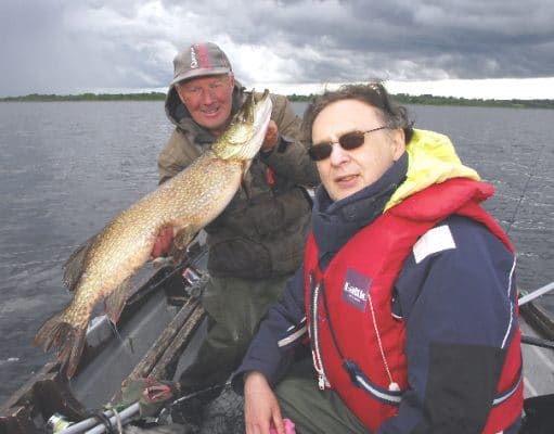 Justin Gordon lands a personal best pike on Lough Derravarragh
