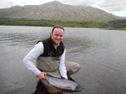 Salmon and sea trout showing at Inagh Fishery manager Colin Folan with his first salmon of the season, a nice 8lbs fish taken at the Derryclare Butts.