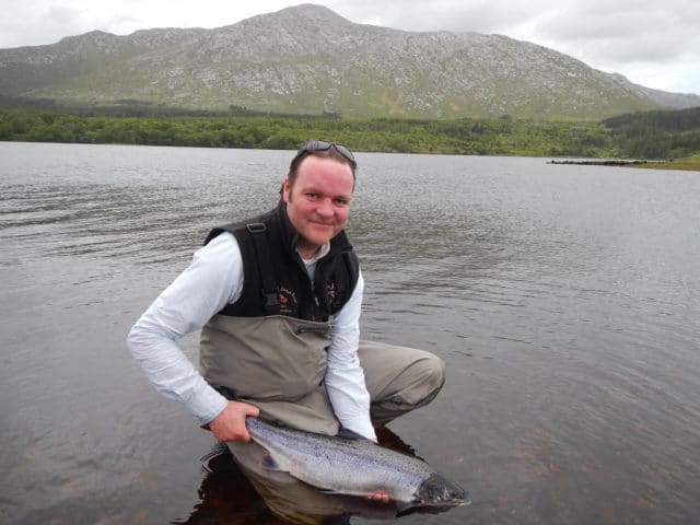Fishery manager Colin Folan with his first salmon of the season, a nice 8lbs fish taken at the Derryclare Butts.