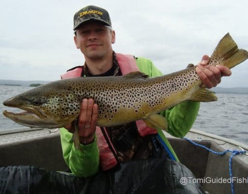 Marek Kozinski with a beautiful 86cm ferox trout from Lough Corrib, taken while fishing with guide Tomi Kurman, June 2014