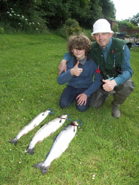 Patrick McGrath, 12, from Mountbellew, with his dad Damian and his first three salmon, which he caught on the Clare River on Monday June 30.