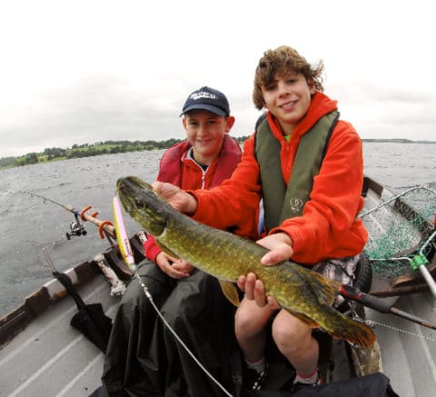 Adam and Kevin Bushe with a nice pike caught on a big lure
