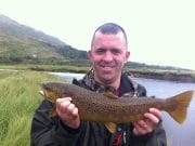 Mask wakes up from summer slumber as fresher conditions get trout moving Alan Crinnion with a fine trout from the Finny River