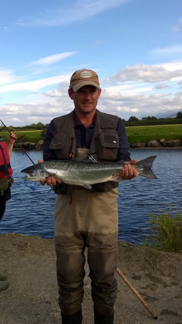 Noel Hickey with a 7 lb sea liced fish on the fly from Johnston's
