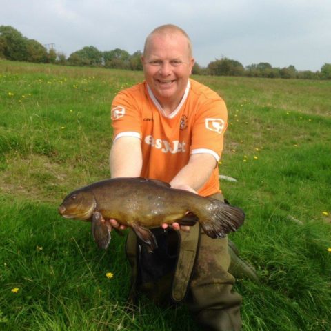 Nigel with a cracking Tench