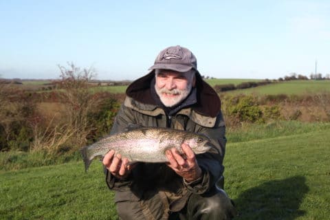 Well known angling journalist with the Irish Angling Digest, Liam with a nice rainbow at the Courtlough Fishery