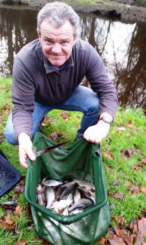 Alan Doyle Displays His Catch at Sundays Event