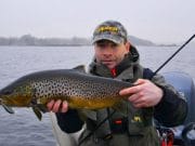 Conditions fail to spoil opening day party on Corrib Fishing guide Jacek Gorny with a fine opening day trout from Corrib