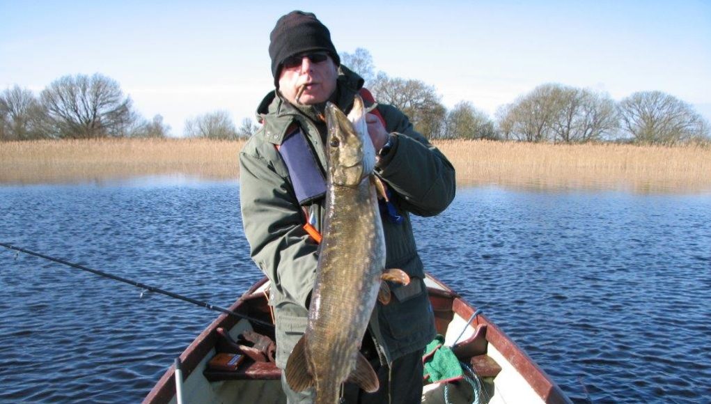 Alain with a cracking Pike taken on float fished Pollan Alain with a cracking Pike taken on float fished Pollan