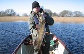 Alain with a cracking Pike taken on float fished Pollan