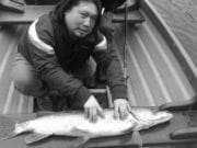 Japanese visitors enjoy pike fishing on Carton Lake
