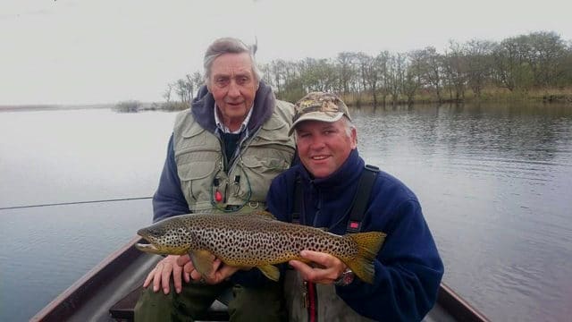 Tim Rowley with a fine 4lbs 2oz Corrib trout, with angling guide Larry McCarthy (holding fish).