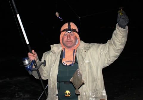 Ivan Murphy With a Flounder is Tough Conditions