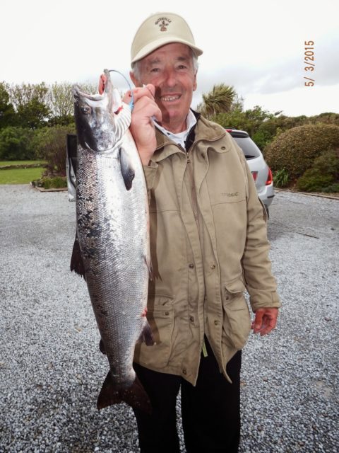 Well known golfer Liam Higgins with a fine 11 lb. salmon on fly