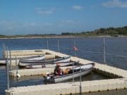 Joys and disappointments of fishing at the new improved Knockaderry fishery The photo is of Greg Coughlan and Tilly docking in the modified harbour