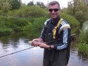 Premier League player Aaron Hughes tackles the fish at Carton House Aaron Hughes on the Rye Water at Carton House.