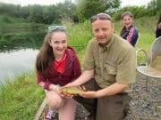 Consistent Fishing for the Dublin Angling Initiative From Blanchardstown Foroige, Lourna Corcoran aged 14 with Oisin Cahill(Dublin Angling Initiative, Inland Fisheries Ireland) and Emma Iacob , catches her first tench at Meadow View Fisheries, Co.Kildare.