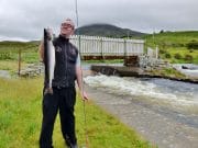 Long-awaited rain gives Inagh a boost just in time for grilse run Lough Inagh Lodge bar manager Thomas Moran with his first ever salmon, a lovely grilse of 6lbs taken at the Derryclare Butts on a Green Highlander