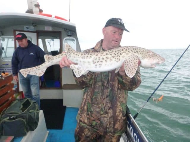 PB for Daniel O'Kelly with huss weighing 11.8lbs