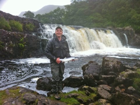 Neil Spellacy from Moycullen with a fresh August grilse at Aasleagh Falls on the Erriff