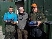 Blazing sunshine but anglers still managed 34 at Carrigavantry Treasurer Pat Smith presenting the trophy and prizes - Shamye Byrne biggest brown at 47 cm and Michael Sheehan competition organizer biggest rainbow 63 cms