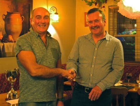 This years Winner Mr. Colin  Wilson receives first prize from Neil O'Shea 